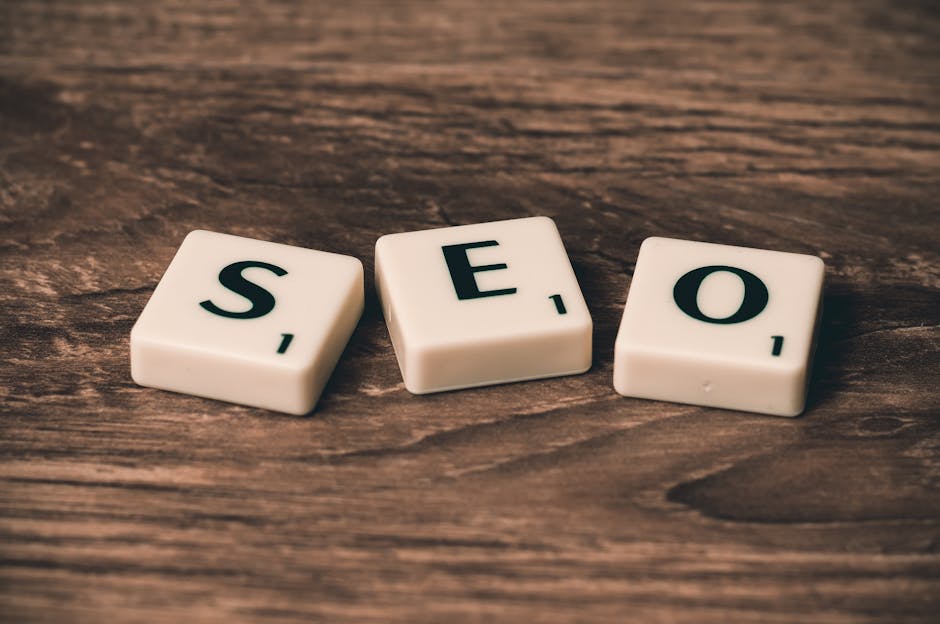 WordPress SEO: Boost Your Site Rankings with Proven Techniques - Scrabble tiles spelling SEO Audit on wooden surface, symbolizing digital marketing strategies.